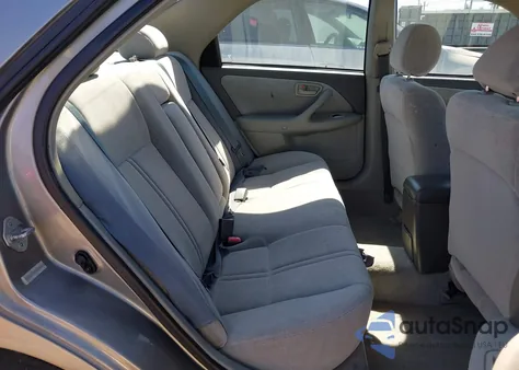 1999 Toyota Camry Le z USA, uszkodzony, nr VIN 4T1BG22K7XU449270